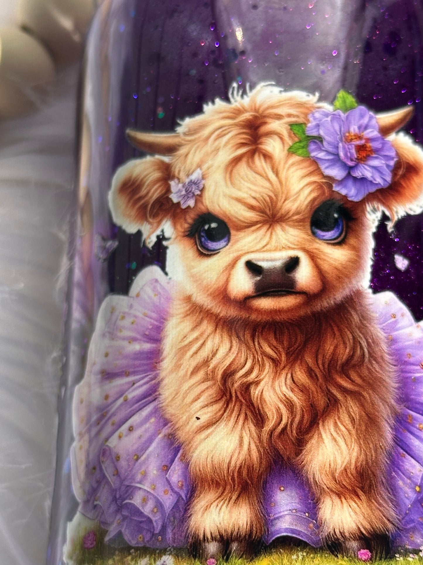 Purple glitter snow globe