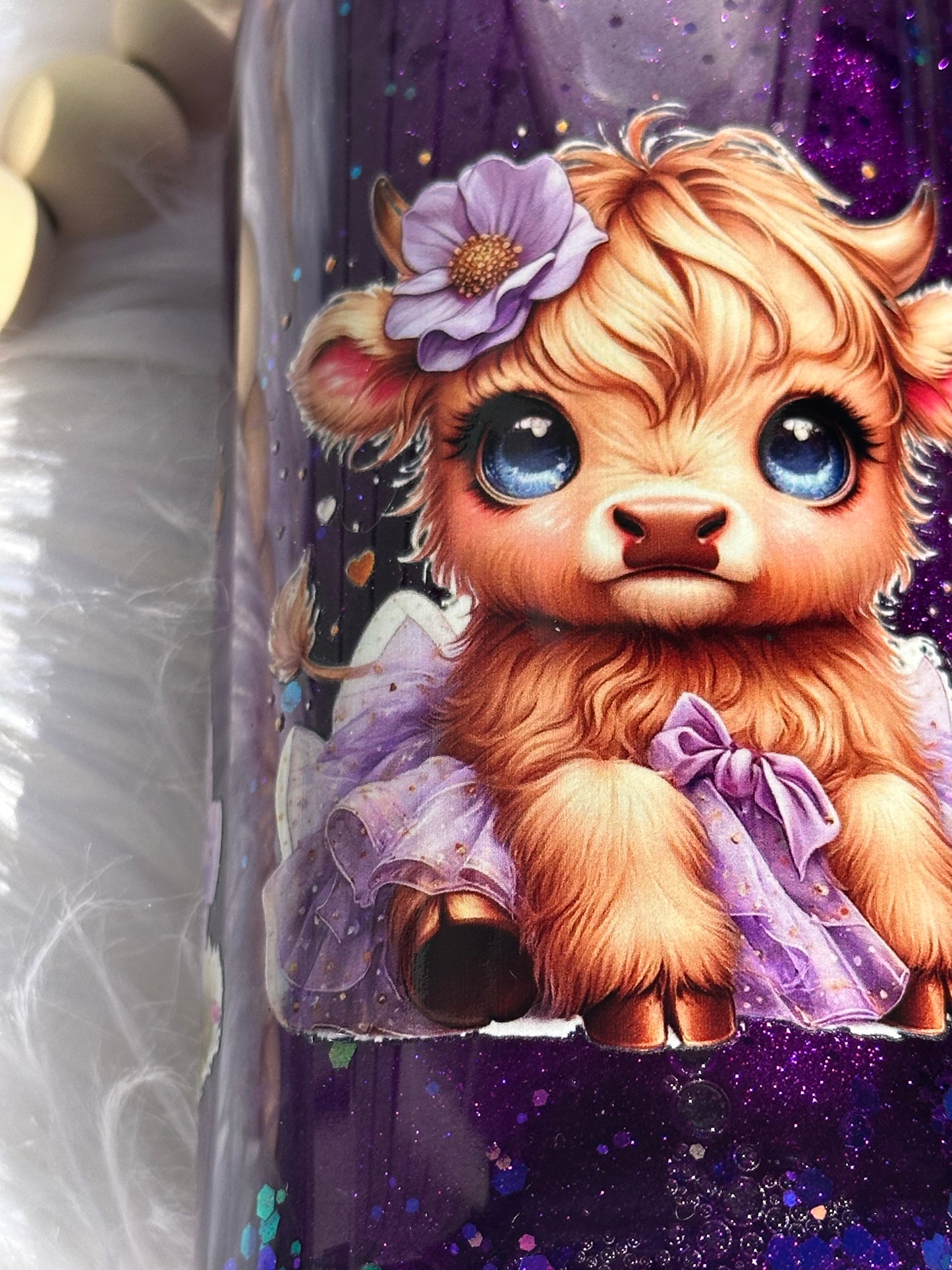 Purple glitter snow globe