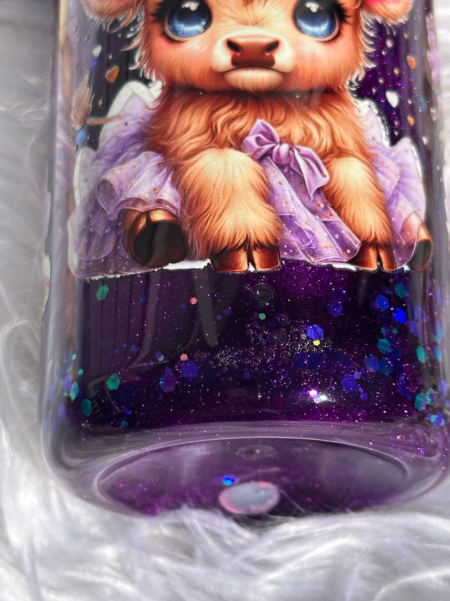 Purple glitter snow globe