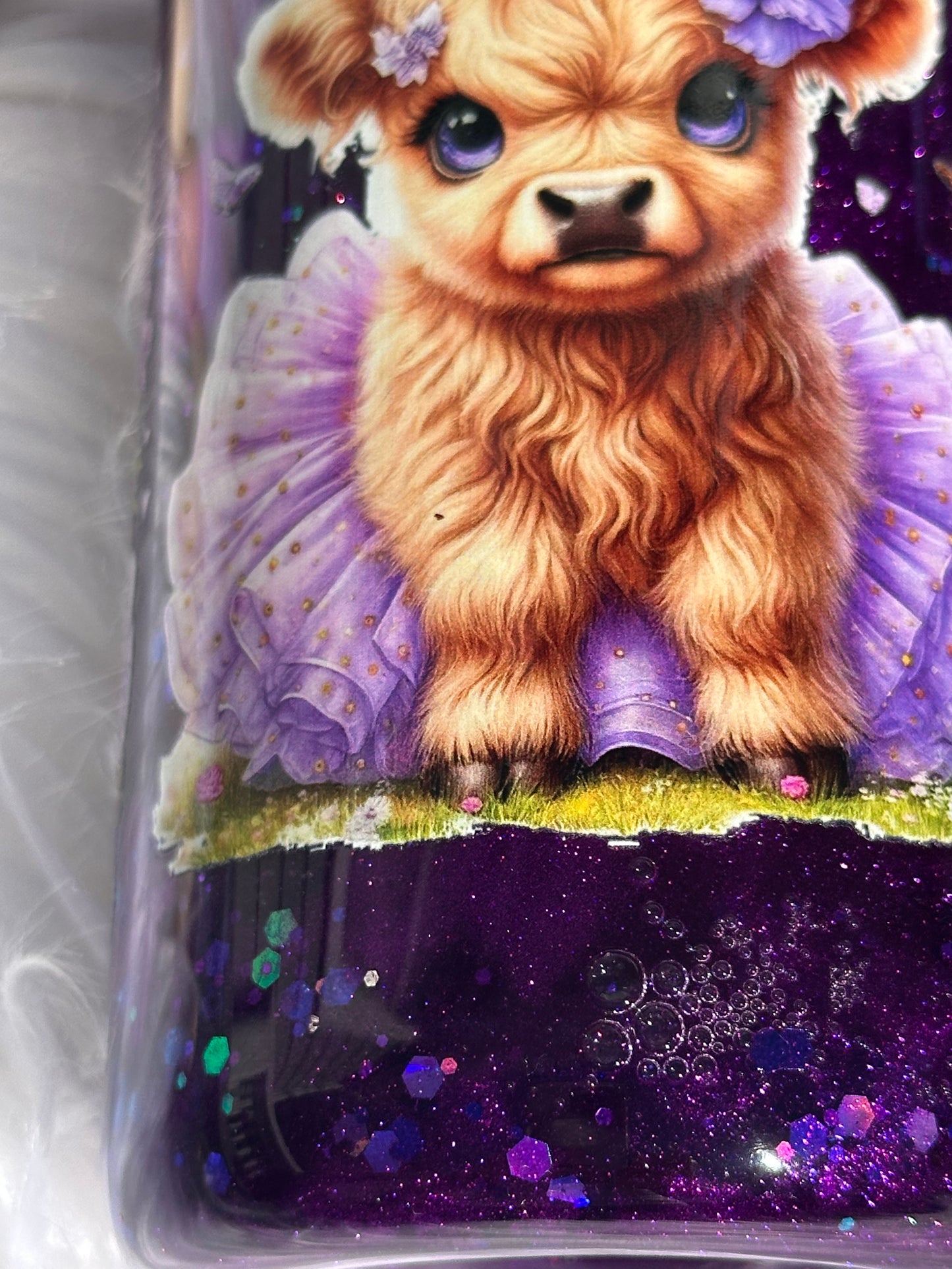 Purple glitter snow globe